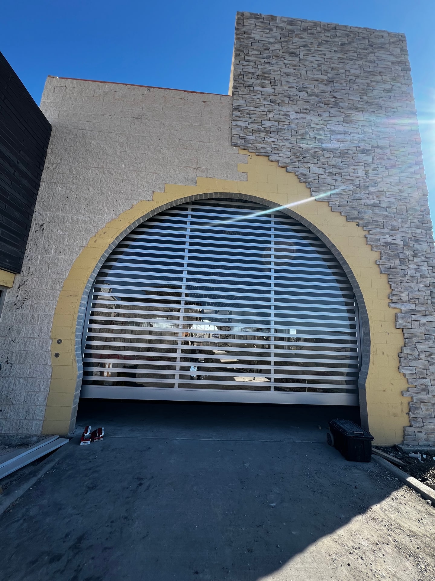 Technician performing garage door repair